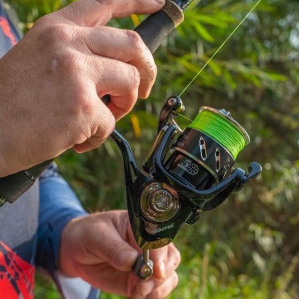 Neon green braided line on a spool fishing